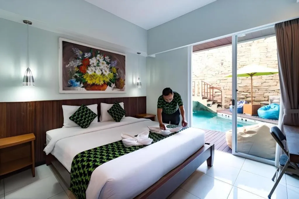 Bed in Hadi Poetra Hotel