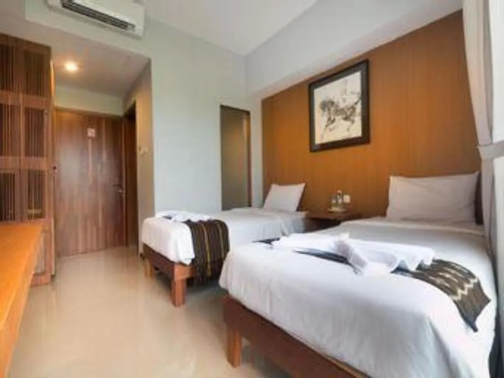 Bed in Hadi Poetra Hotel