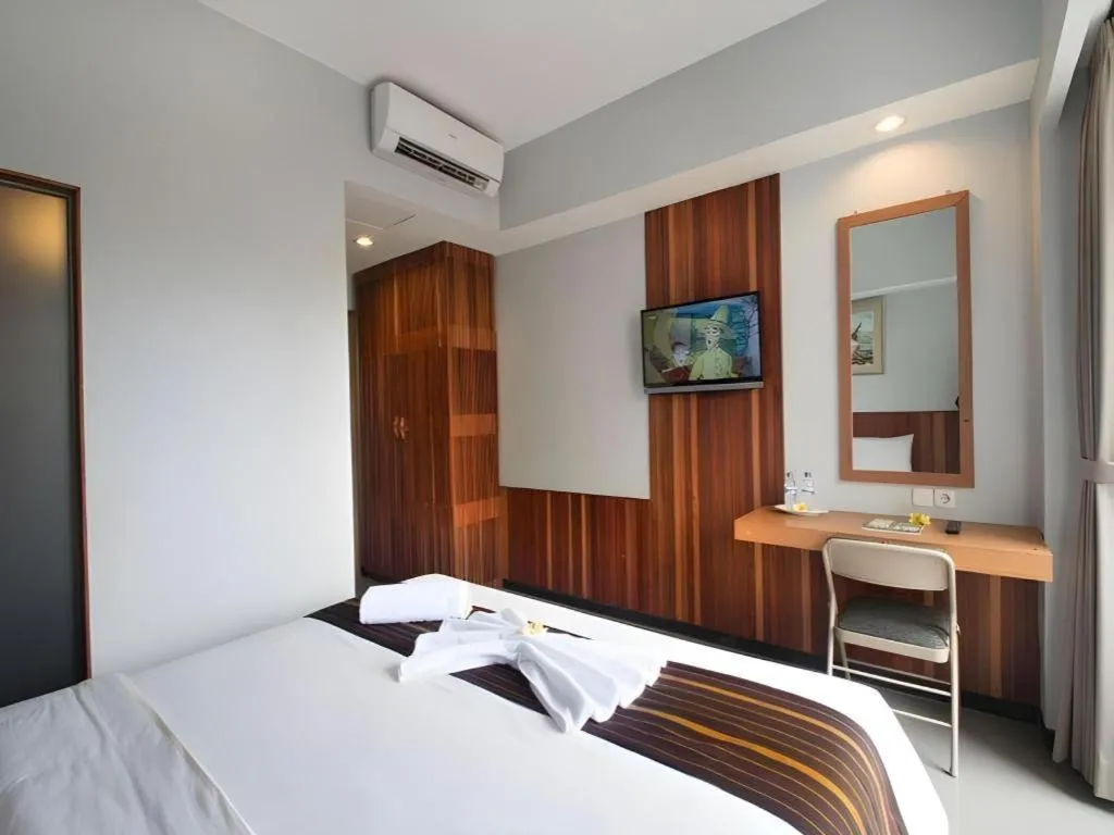Bed in Hadi Poetra Hotel