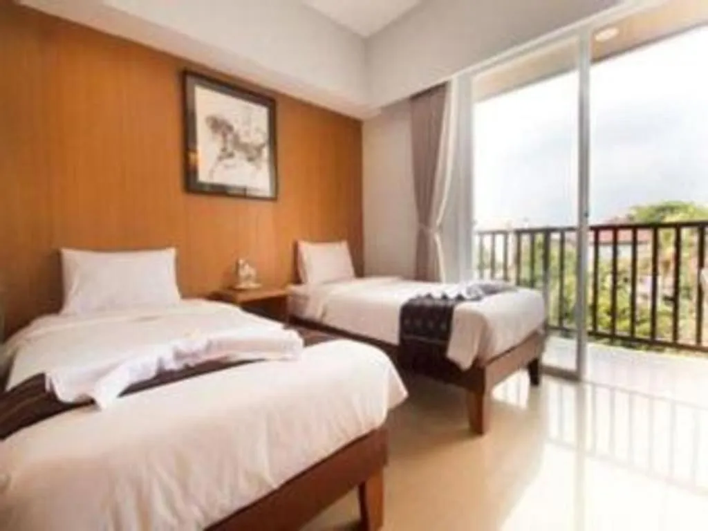 Bed in Hadi Poetra Hotel
