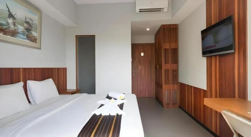 Bed in Hadi Poetra Hotel