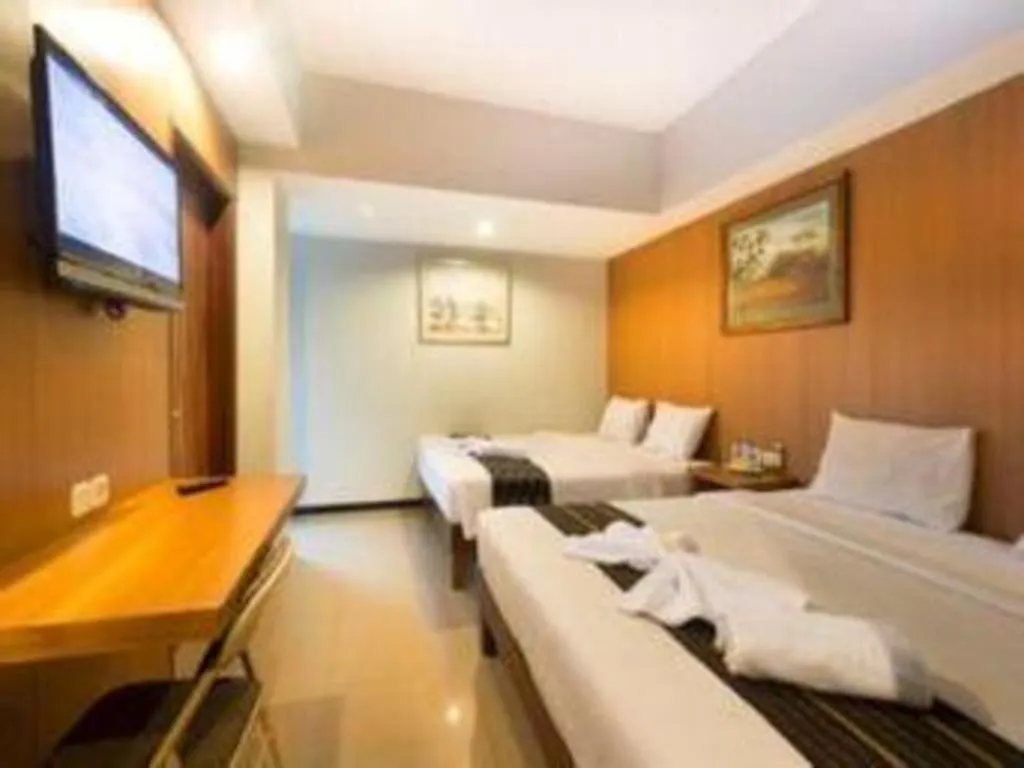 Bed in Hadi Poetra Hotel