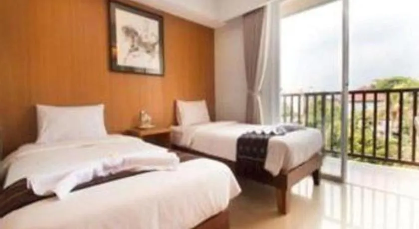 Bed in Hadi Poetra Hotel
