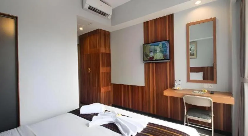 Bed in Hadi Poetra Hotel