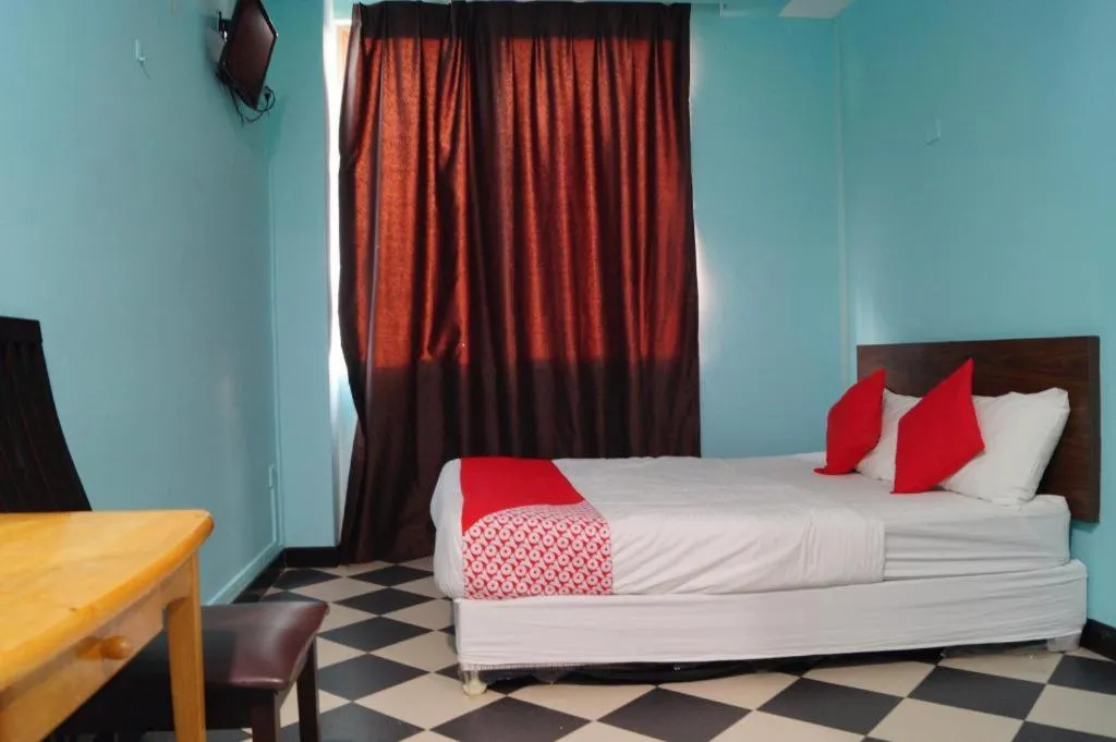 Bed in BudgetOne Hotel