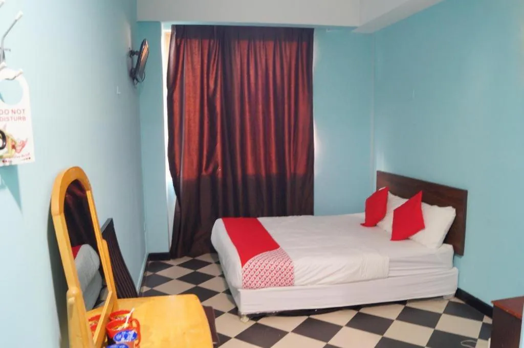 Bed in BudgetOne Hotel