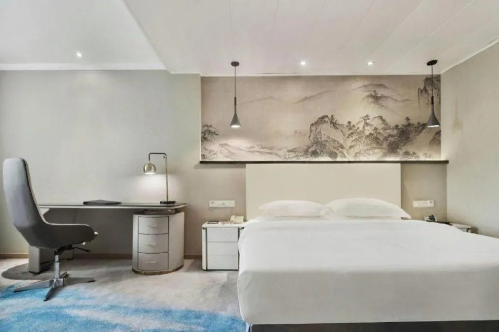 Bed in Chongqing Tianyou Hotel