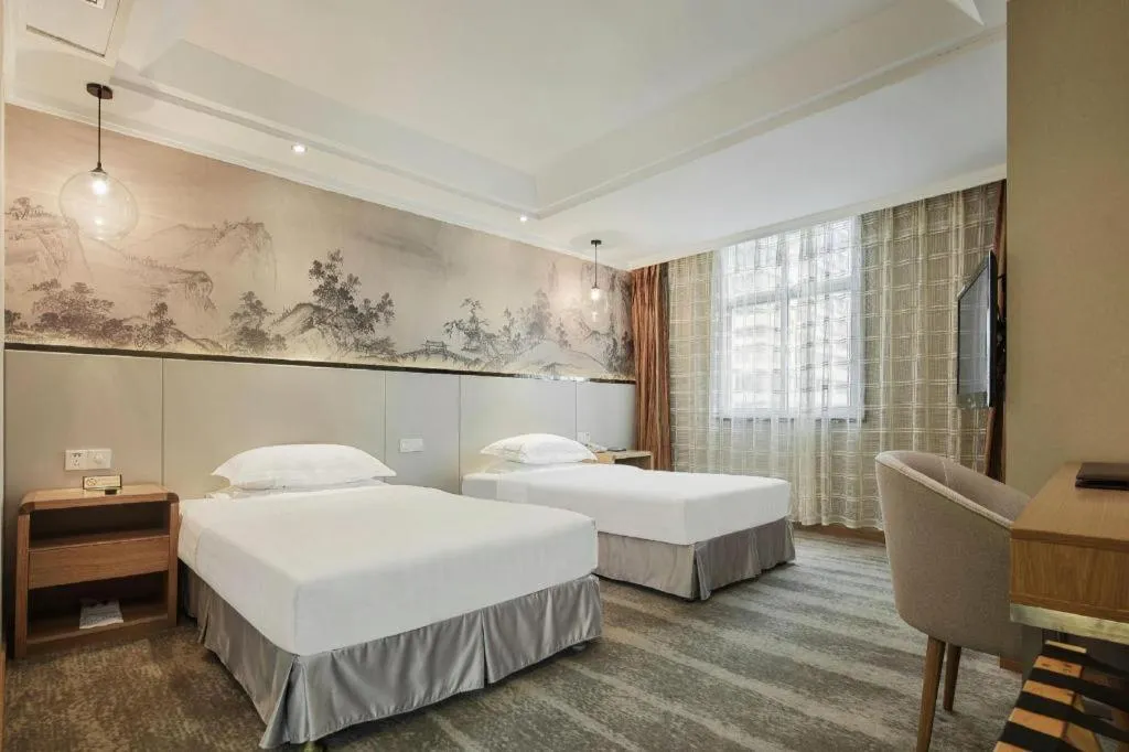 Bed in Chongqing Tianyou Hotel