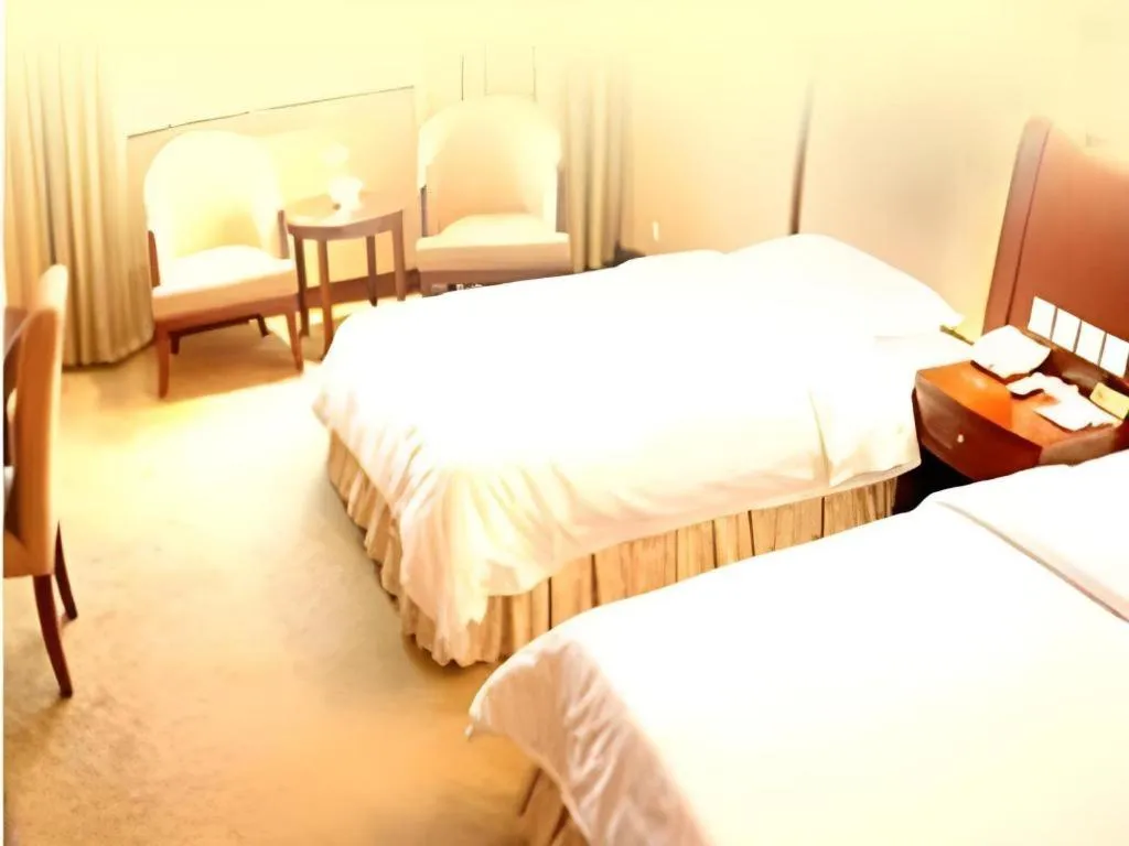 Bed in Chongqing Tianyou Hotel