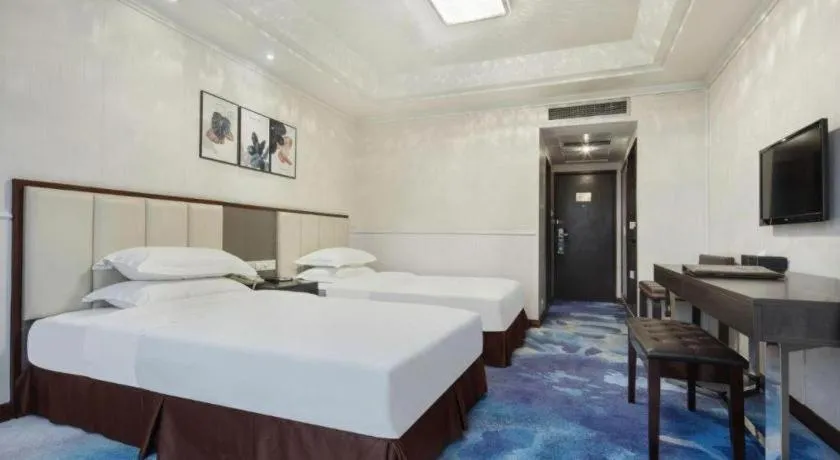 Bed in Chongqing Tianyou Hotel