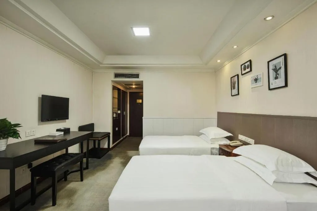 Bed in Chongqing Tianyou Hotel