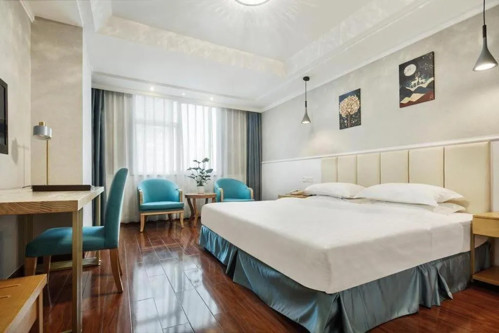 Bed in Chongqing Tianyou Hotel