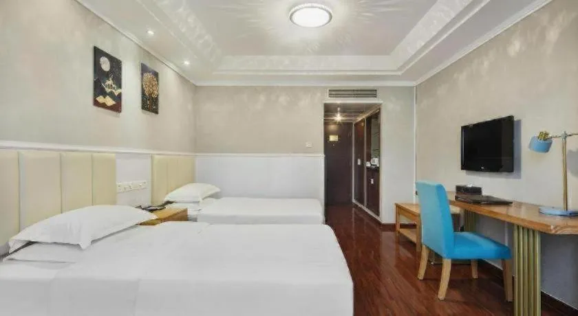 Bed in Chongqing Tianyou Hotel