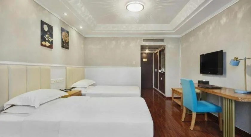 Bed in Chongqing Tianyou Hotel