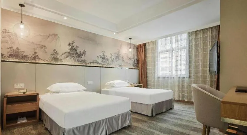 Bed in Chongqing Tianyou Hotel