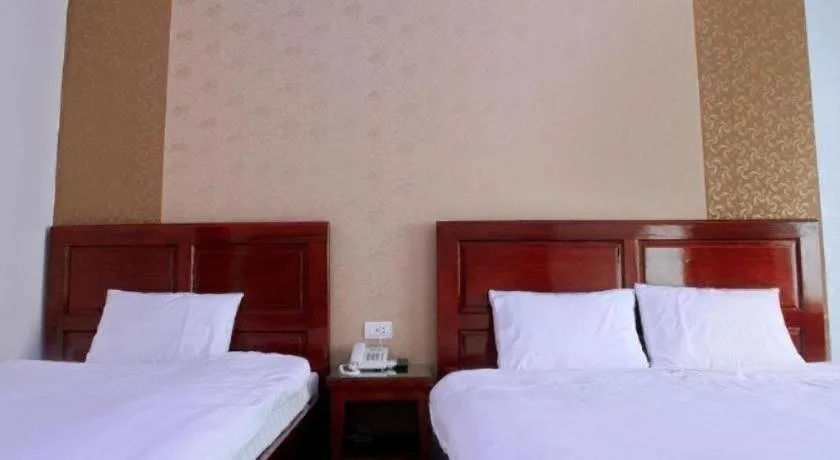 Bed in Ngoc Bach Hotel