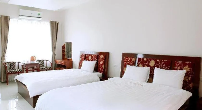 Bed in Ngoc Bach Hotel