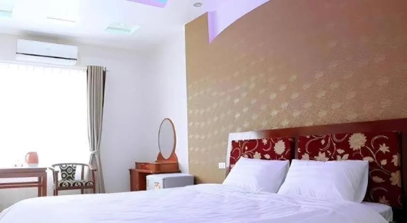 Bed in Ngoc Bach Hotel