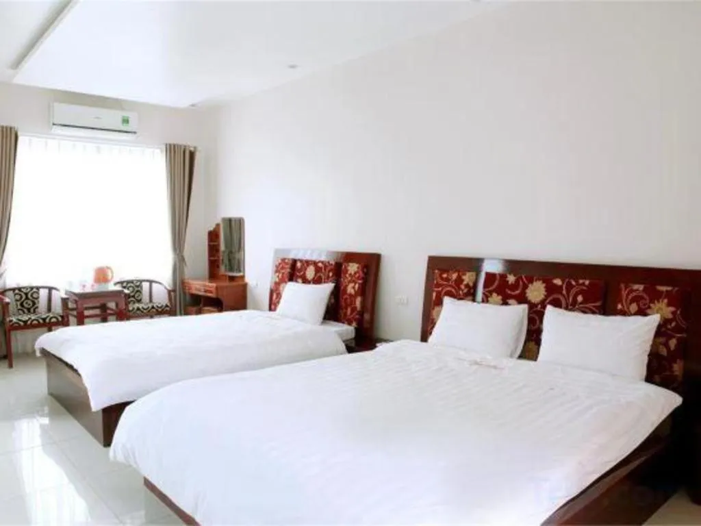 Bed in Ngoc Bach Hotel