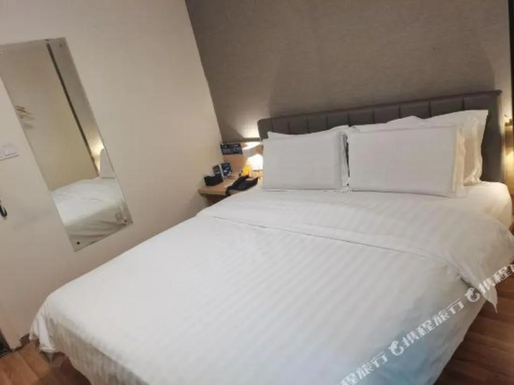 Bed in 7 Days Inn Chongqing Nanping Wanda Plaza Exhibition Center