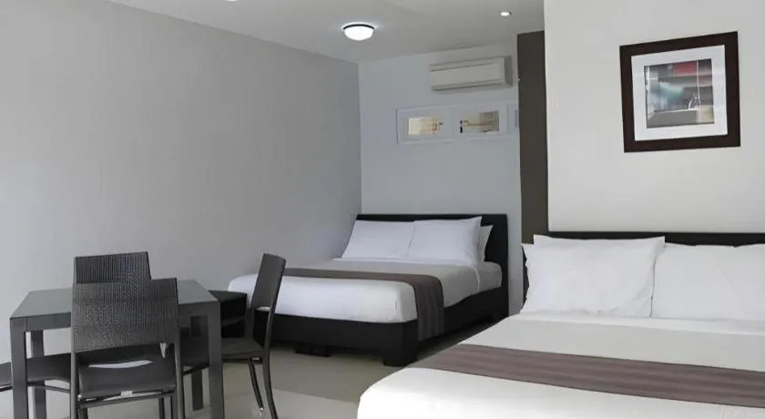 Bed in Anilao Awari Bay Resort