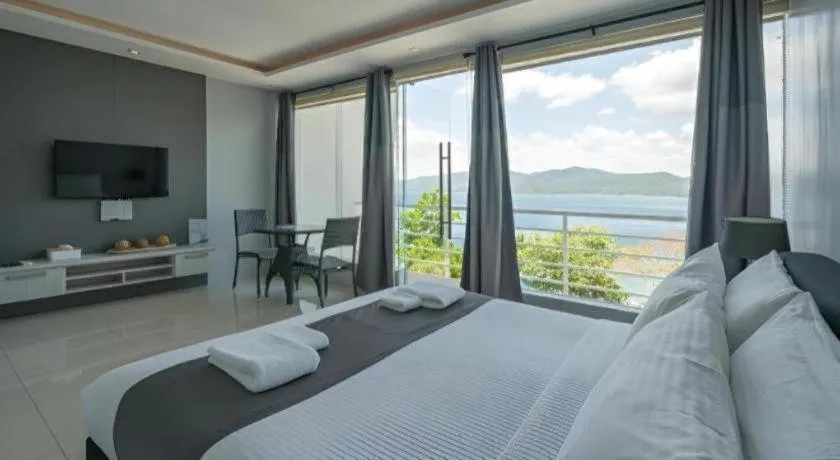 Bed in Anilao Awari Bay Resort