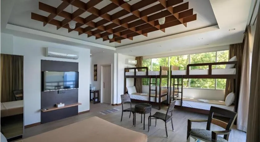 Bed in Anilao Awari Bay Resort