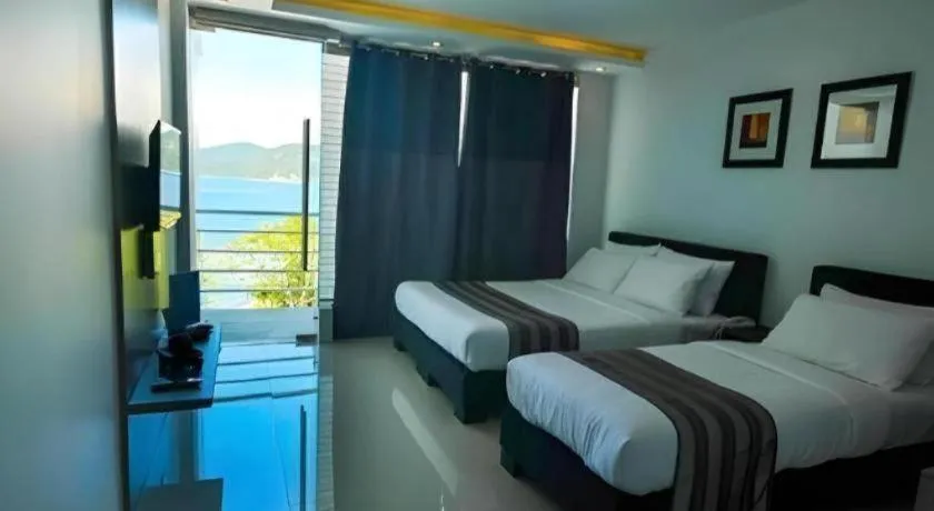 Bed in Anilao Awari Bay Resort