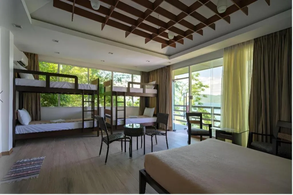 Bed in Anilao Awari Bay Resort