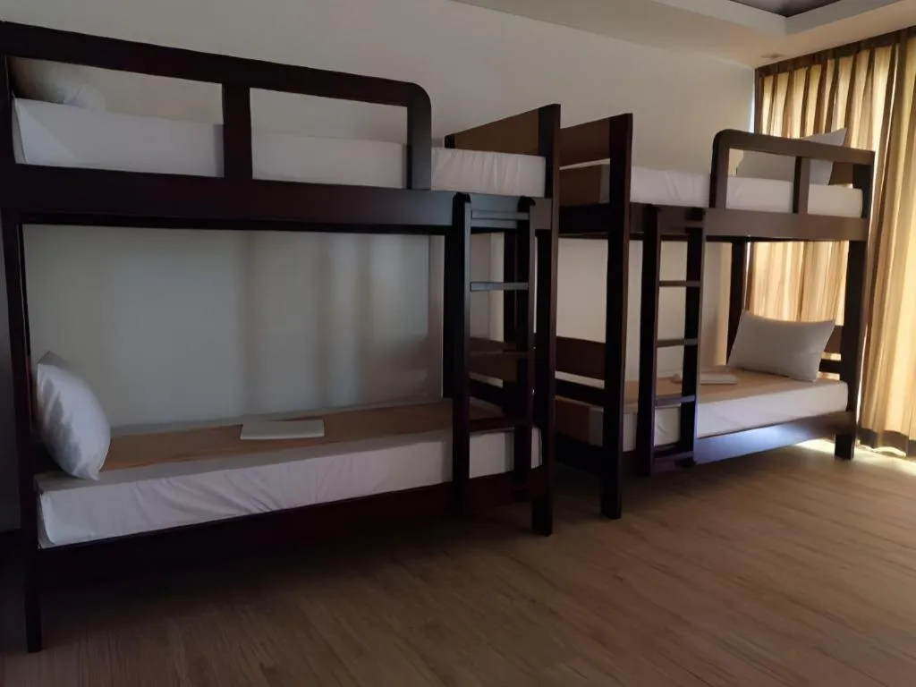 Bed in Anilao Awari Bay Resort