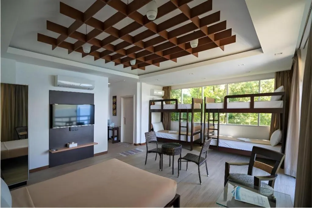 Bed in Anilao Awari Bay Resort