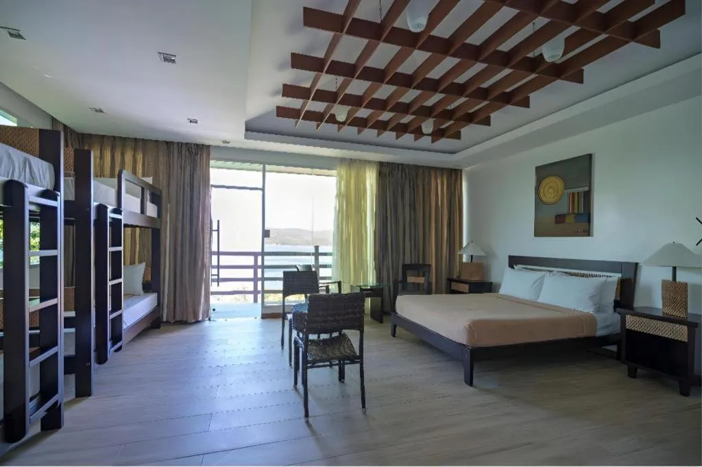 Bed in Anilao Awari Bay Resort
