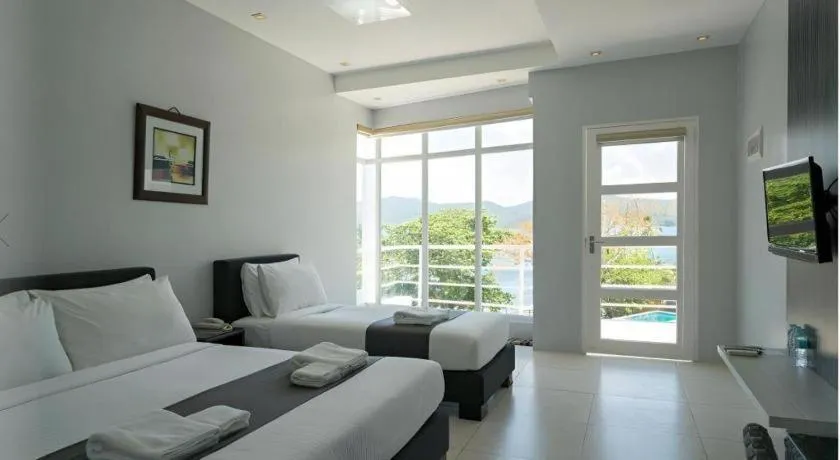 Bed in Anilao Awari Bay Resort