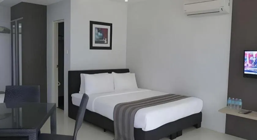 Bed in Anilao Awari Bay Resort