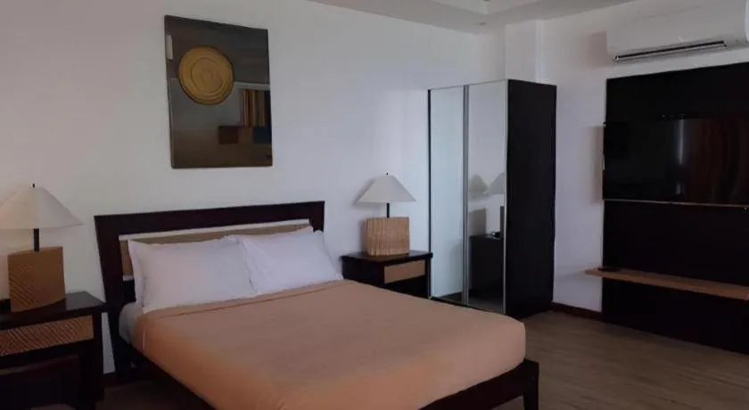 Bed in Anilao Awari Bay Resort