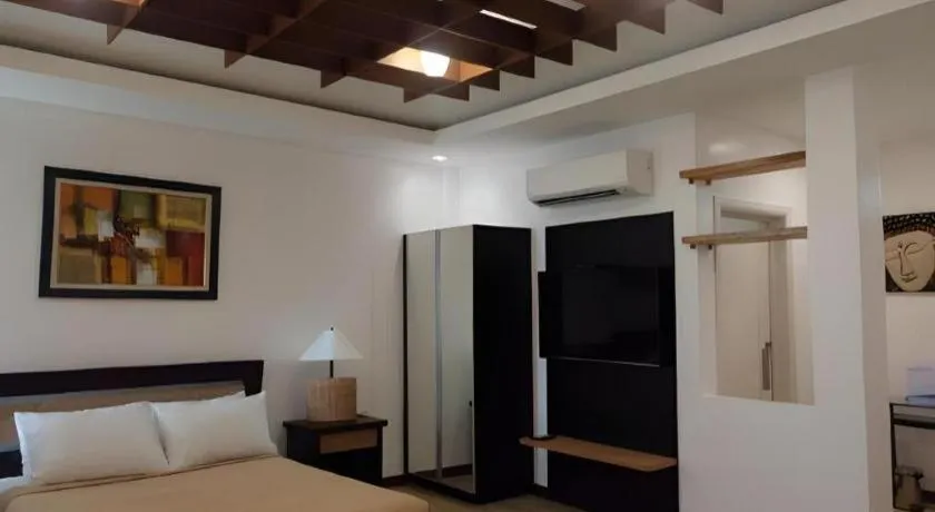 Bed in Anilao Awari Bay Resort