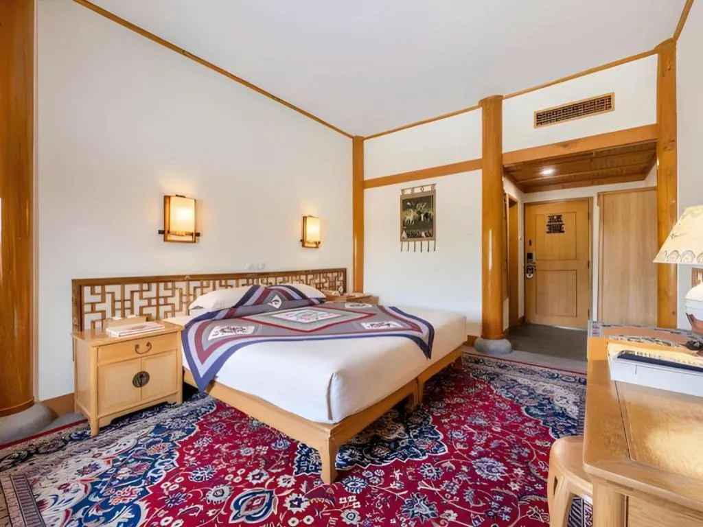 Bed in The Silk Road Dunhuang Hotel