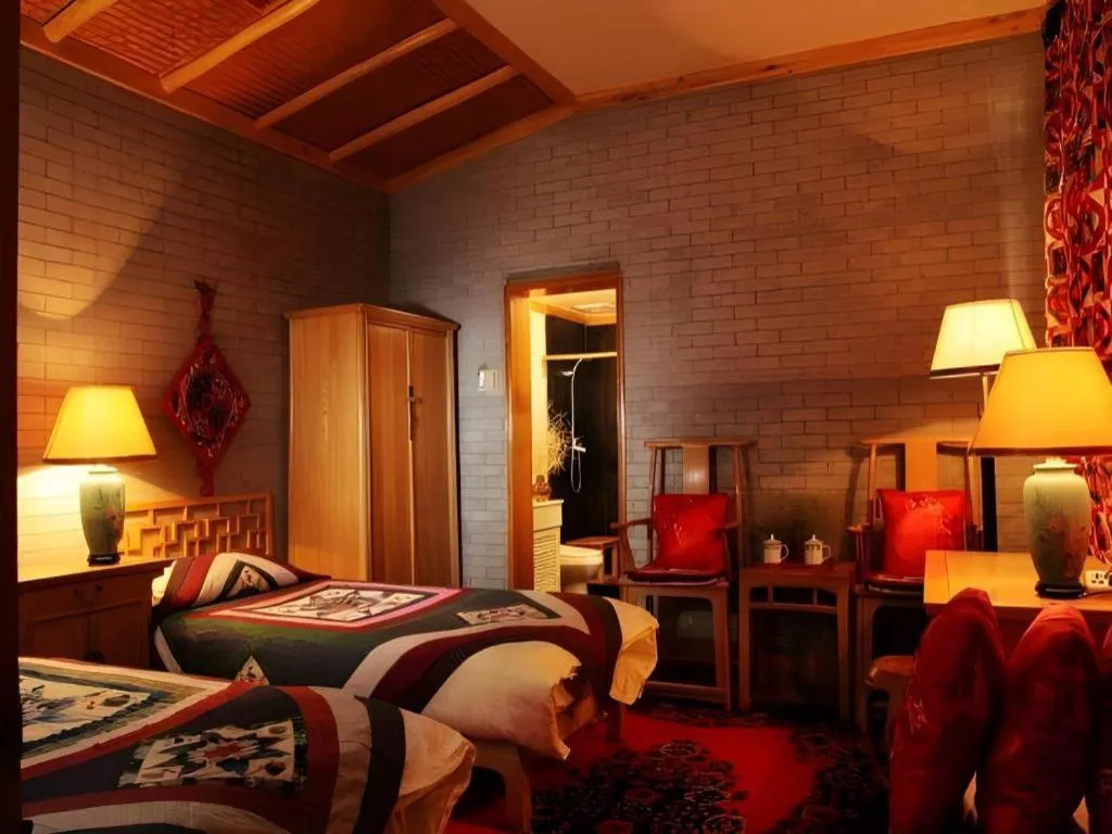 Bed in The Silk Road Dunhuang Hotel