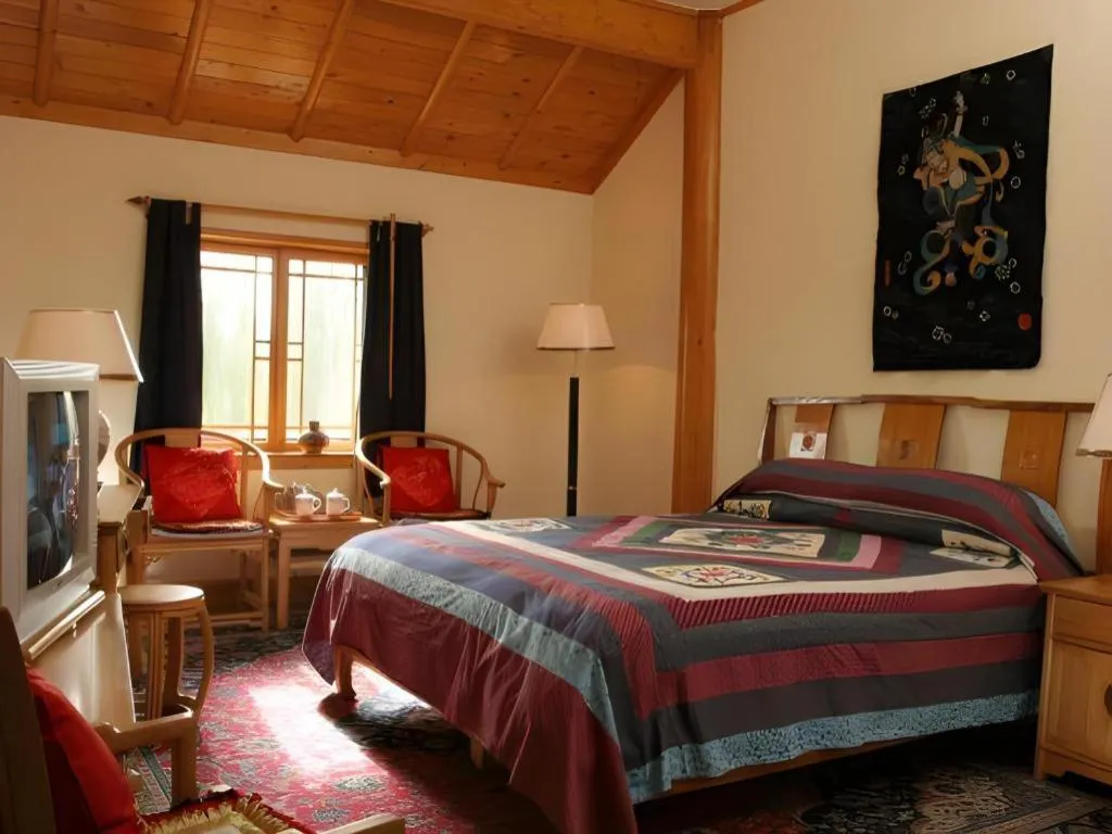 Bed in The Silk Road Dunhuang Hotel