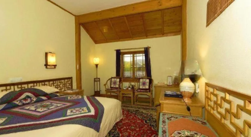 Bed in The Silk Road Dunhuang Hotel