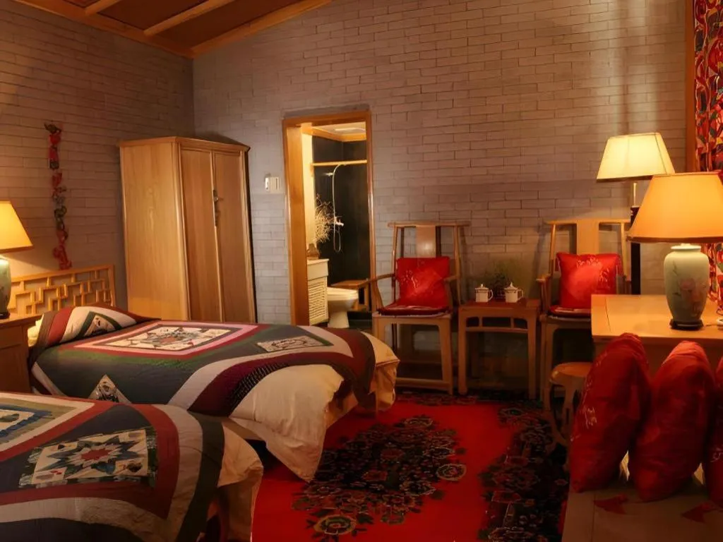 Bed in The Silk Road Dunhuang Hotel