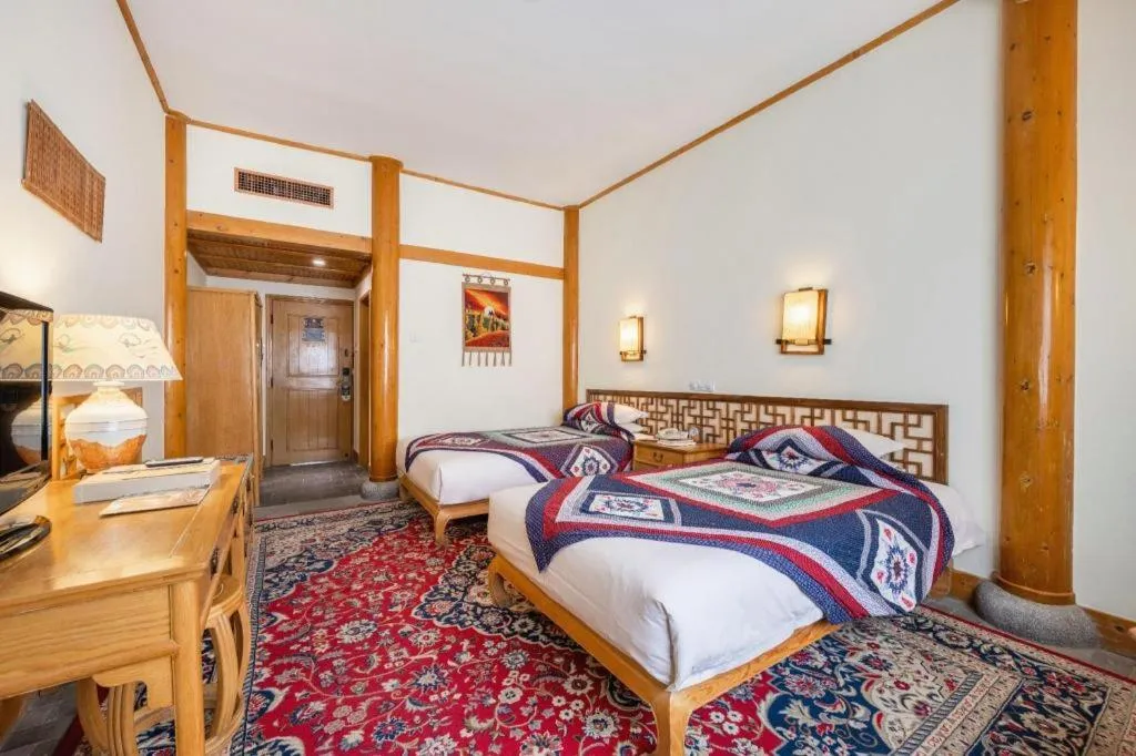 Bed in The Silk Road Dunhuang Hotel