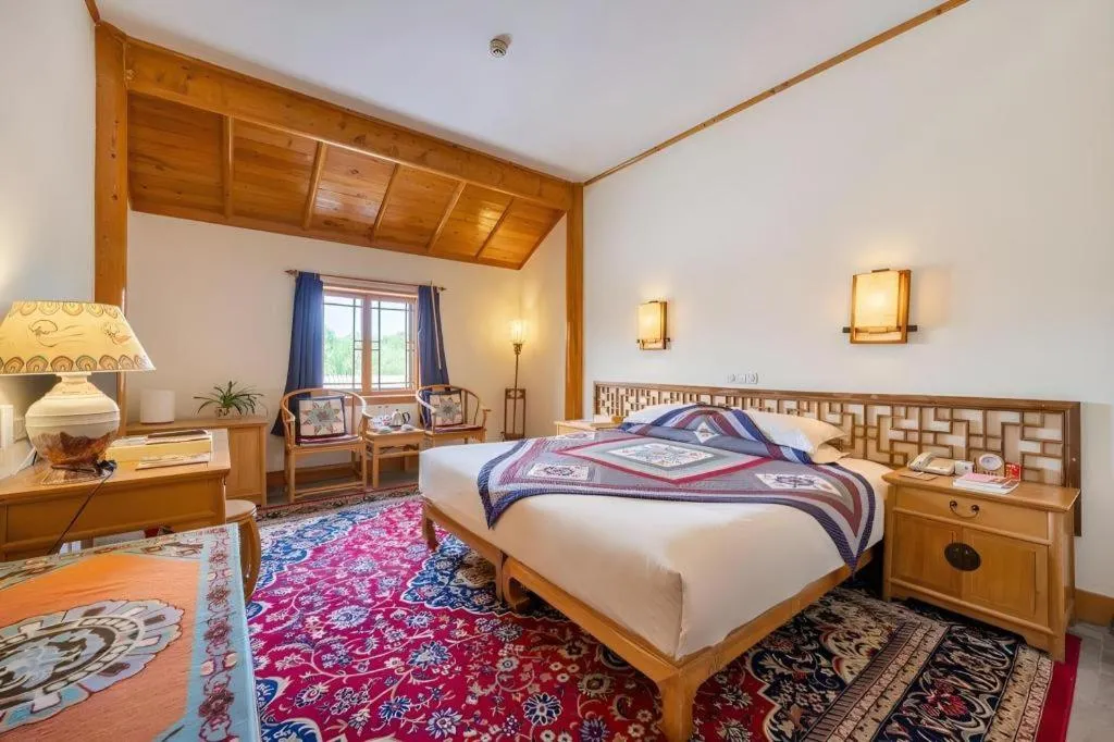 Bed in The Silk Road Dunhuang Hotel