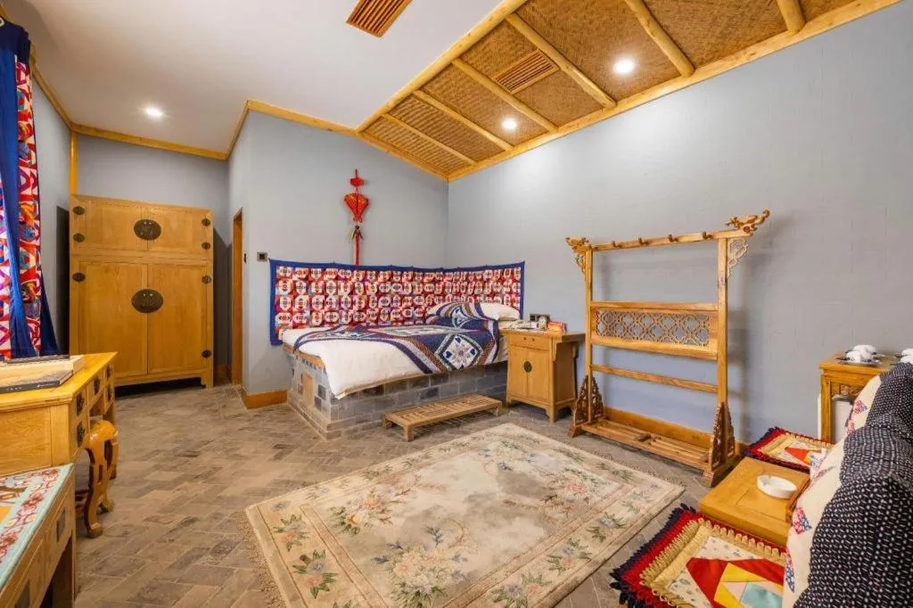 Bed in The Silk Road Dunhuang Hotel