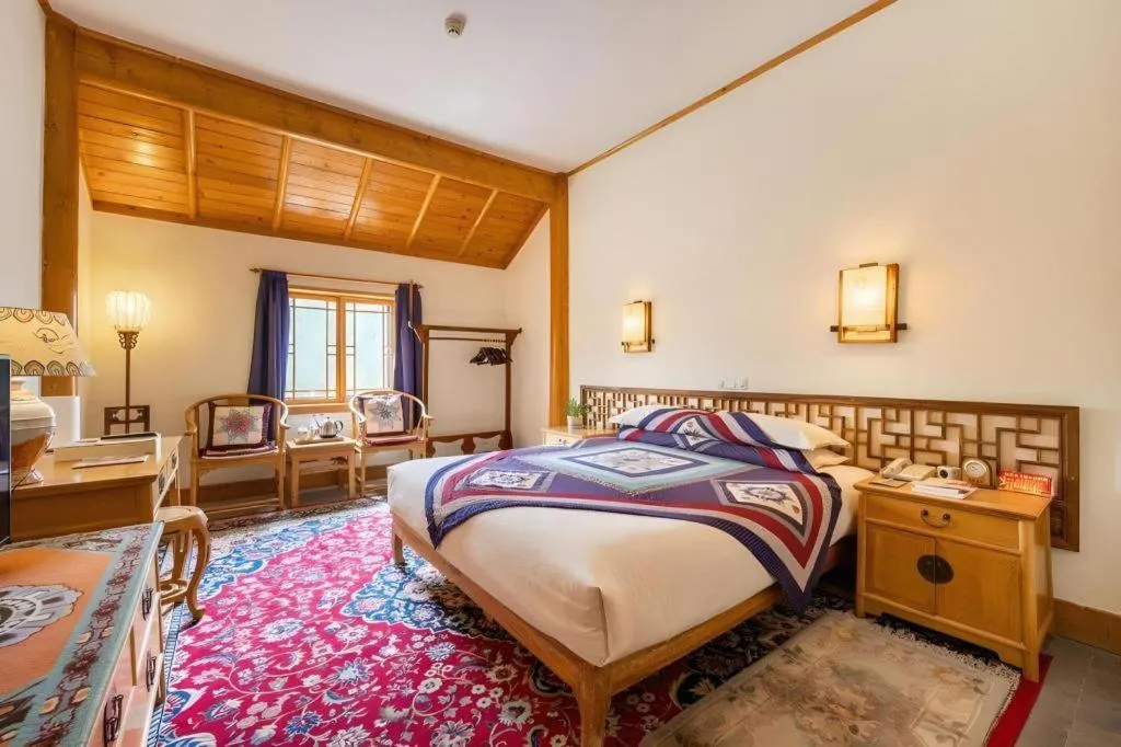 Bed in The Silk Road Dunhuang Hotel