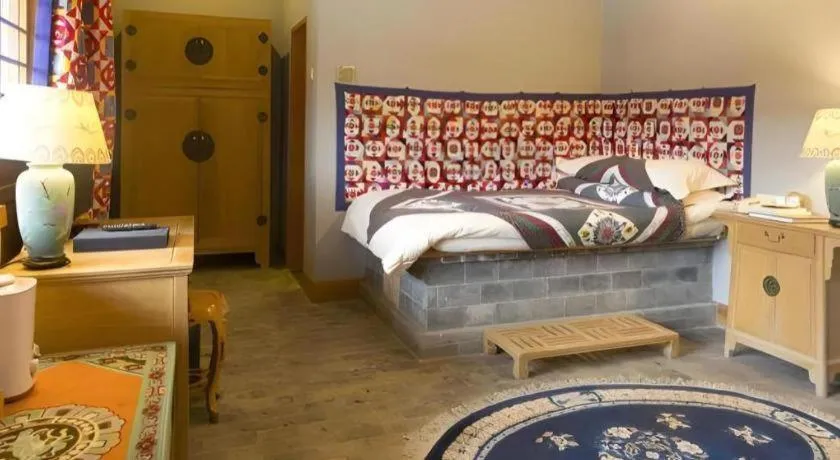 Bed in The Silk Road Dunhuang Hotel