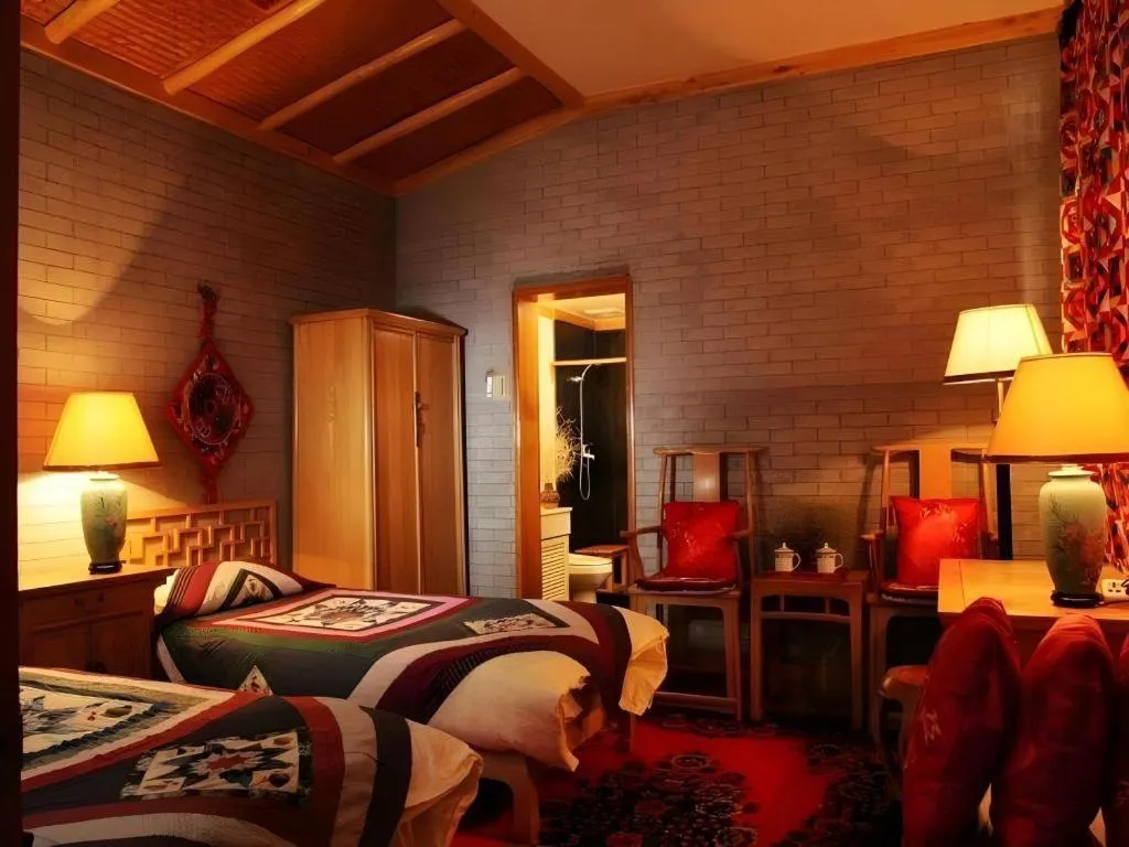 Bed in The Silk Road Dunhuang Hotel