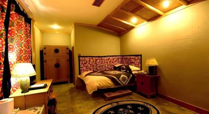 Bed in The Silk Road Dunhuang Hotel