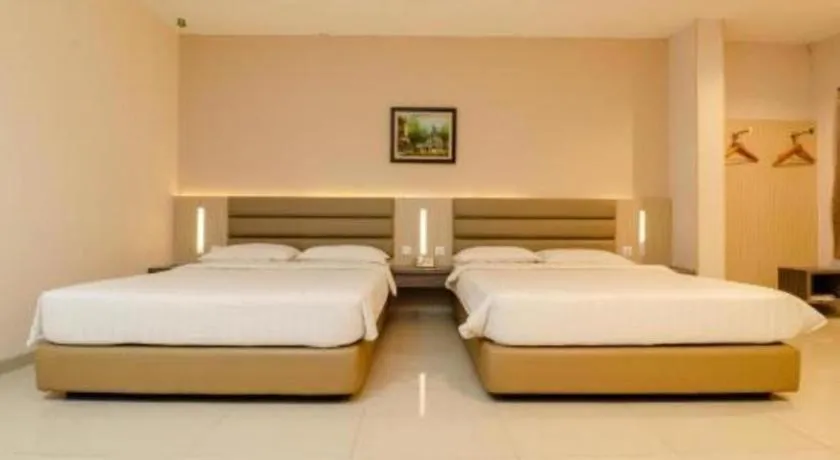 Bed in Lovina Inn Hotel Batam