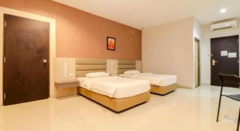 Bed in Lovina Inn Hotel Batam